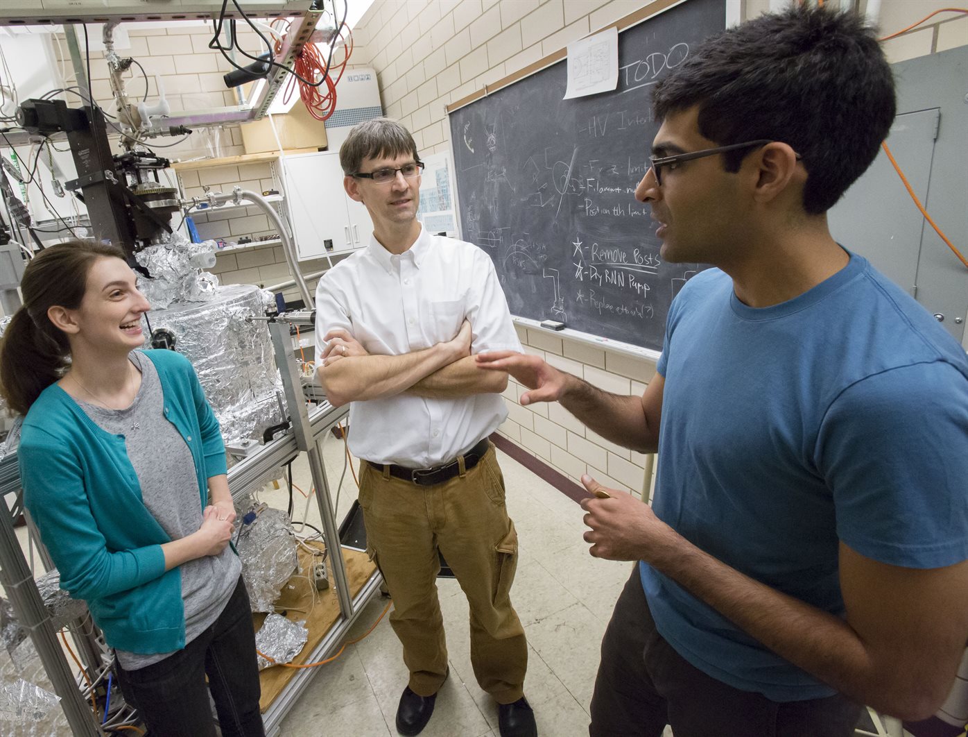 Illinois Physics Professor Peter Abbamonte (center) works with graduate students Mindy Rak (left) and Anshul Kogar in his lab at the Frederick Seitz Materials Research Laboratory. Photo by L. Brian Stauffer