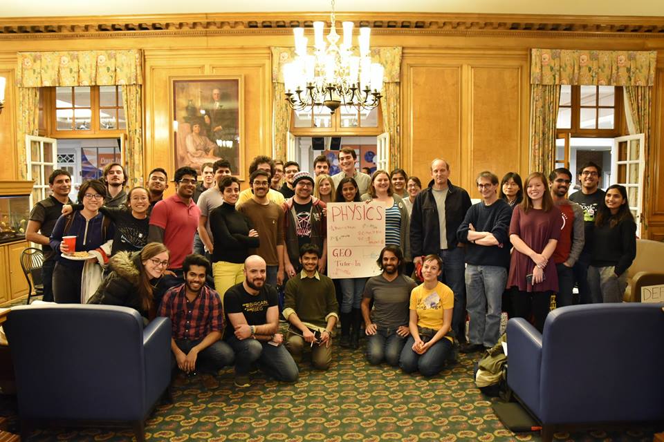 The Physics GEO Tutor-In. Standing to the right of Gutmann are Professors Lance Cooper and Nigel Goldenfeld who participated in the event.