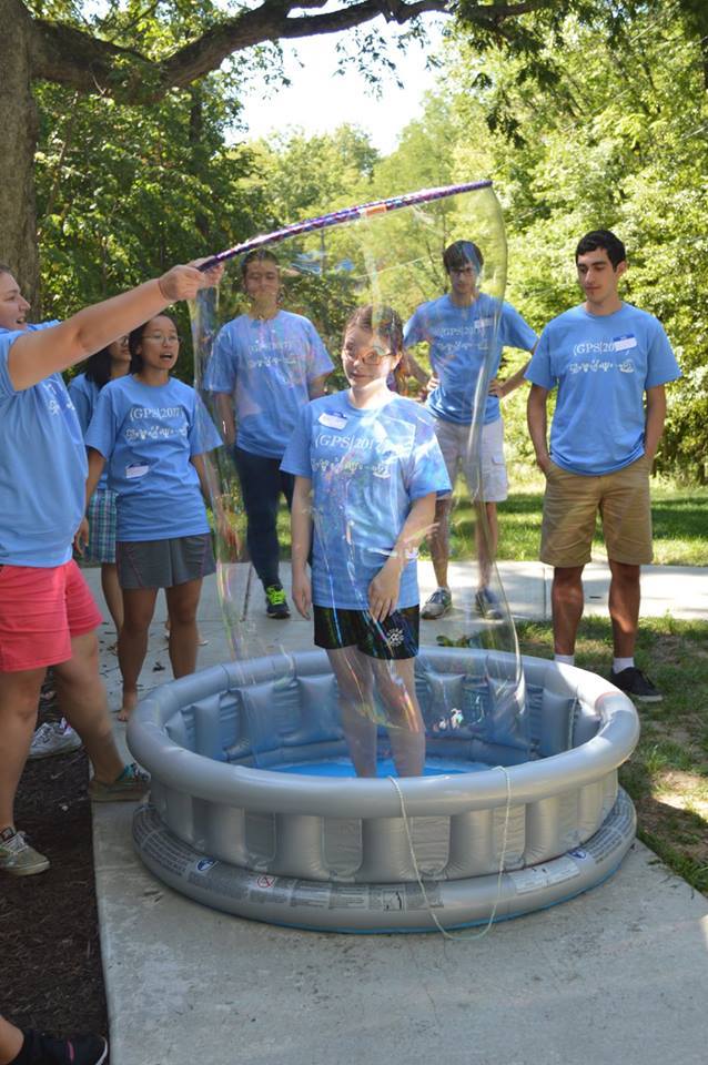Brianne Gutmann is enveloping Illinois Physics sophomore Alexandra Trauth in a bubble