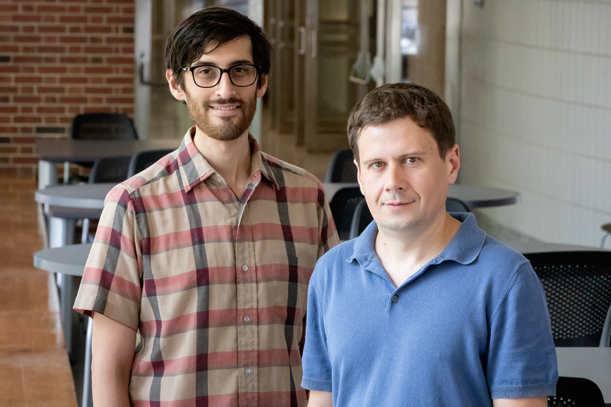 Postdoctoral researcher Christopher Maffeo (left) and physics professor Aleksei Aksimentiev pose in the Loomis Laboratory of Physics in Urbana. The team used the Blue Waters supercomputer to model synthetic DNA enzymes. &lt;br /&gt;Photo by L. Brian Stauffer, University of Illinois at Urbana-Champaign