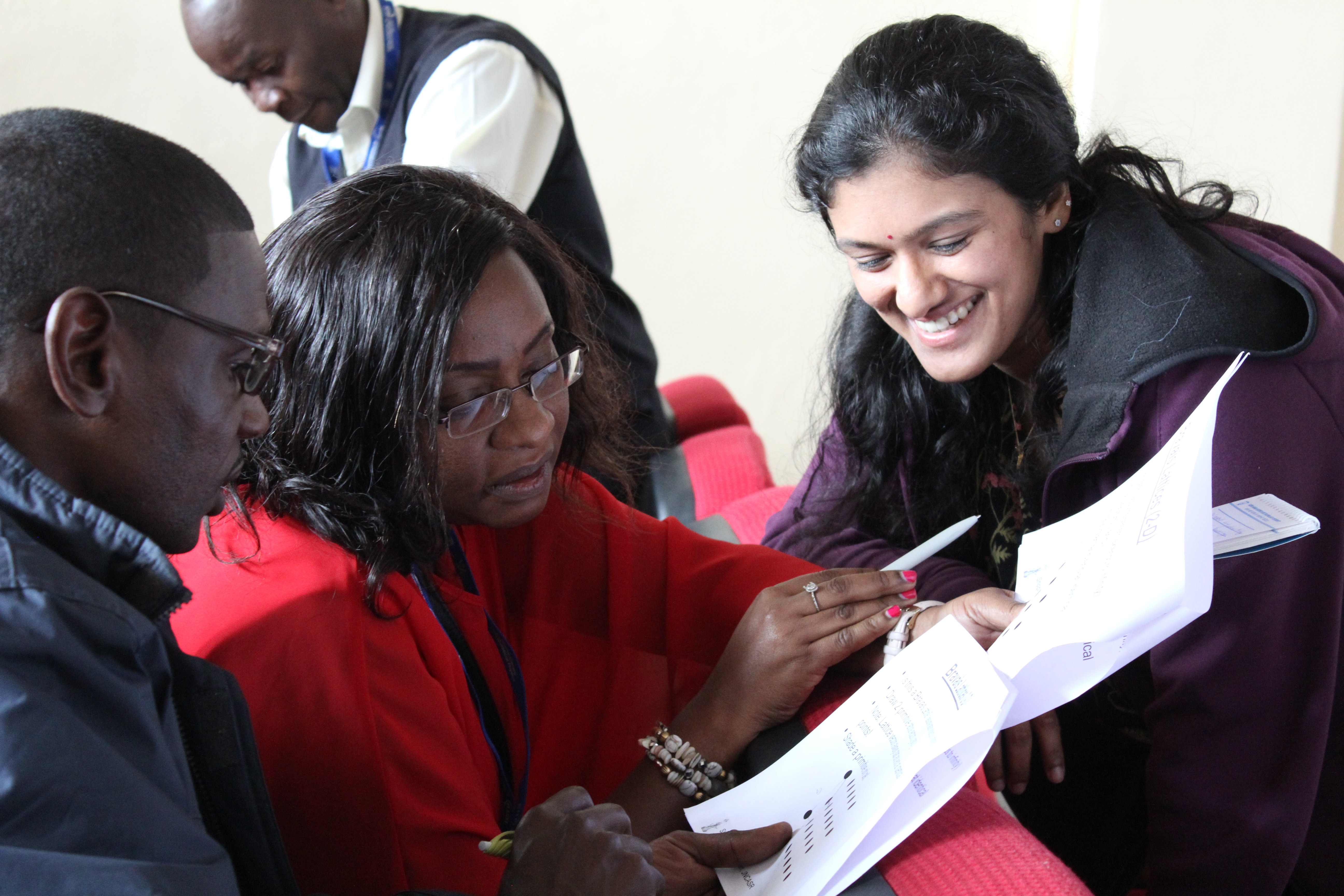 ASESMA mentors working with participants