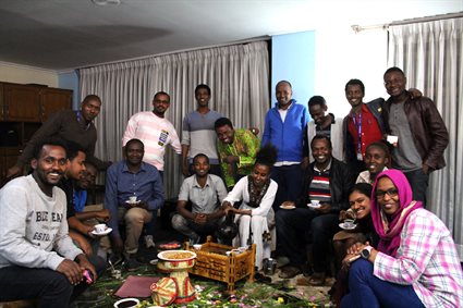 ASESMA participants enjoying after-dinner coffee Ethiopian style.&nbsp;