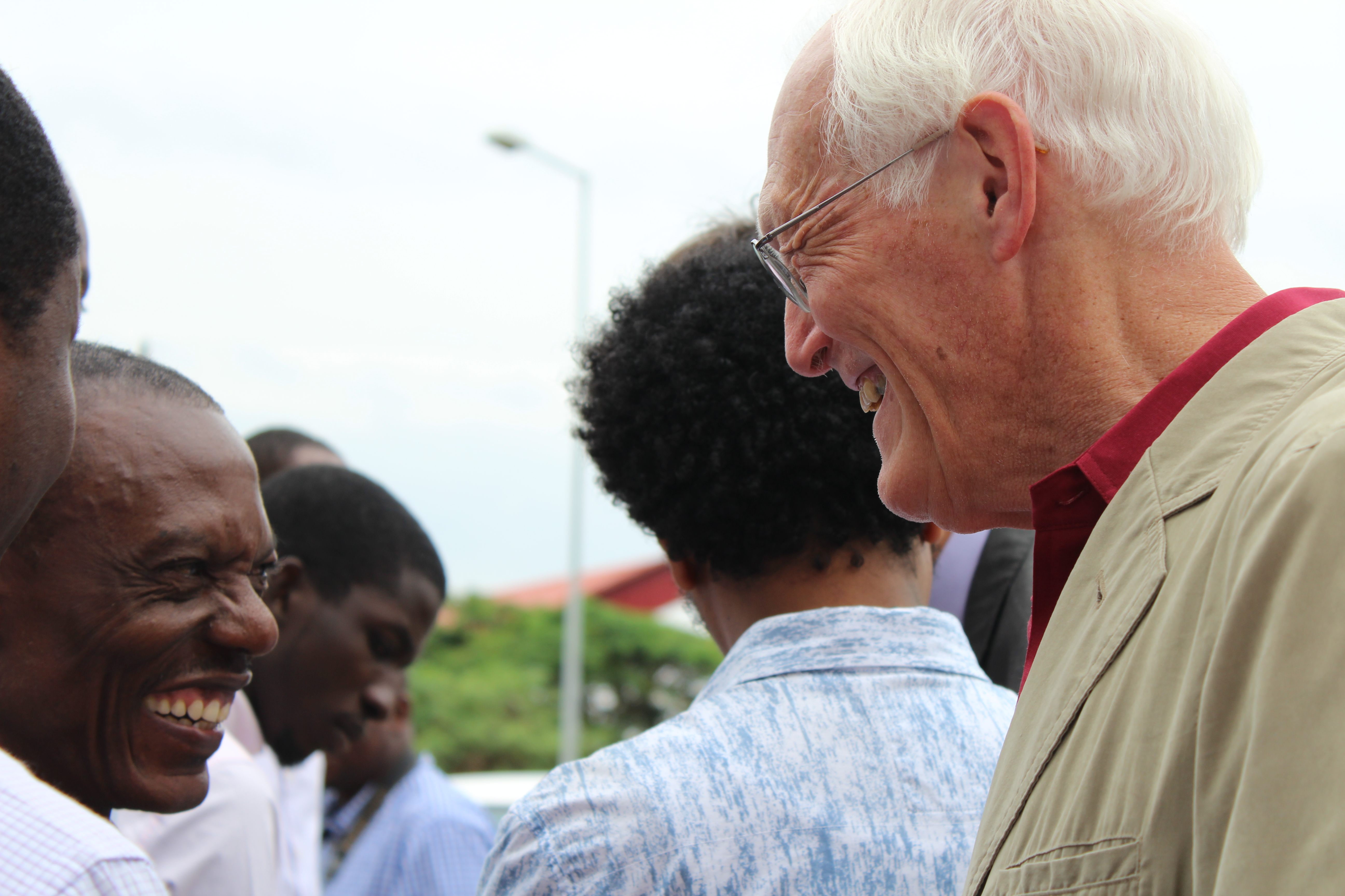 Richard Martin (right) visits with a participant during a coffee break.