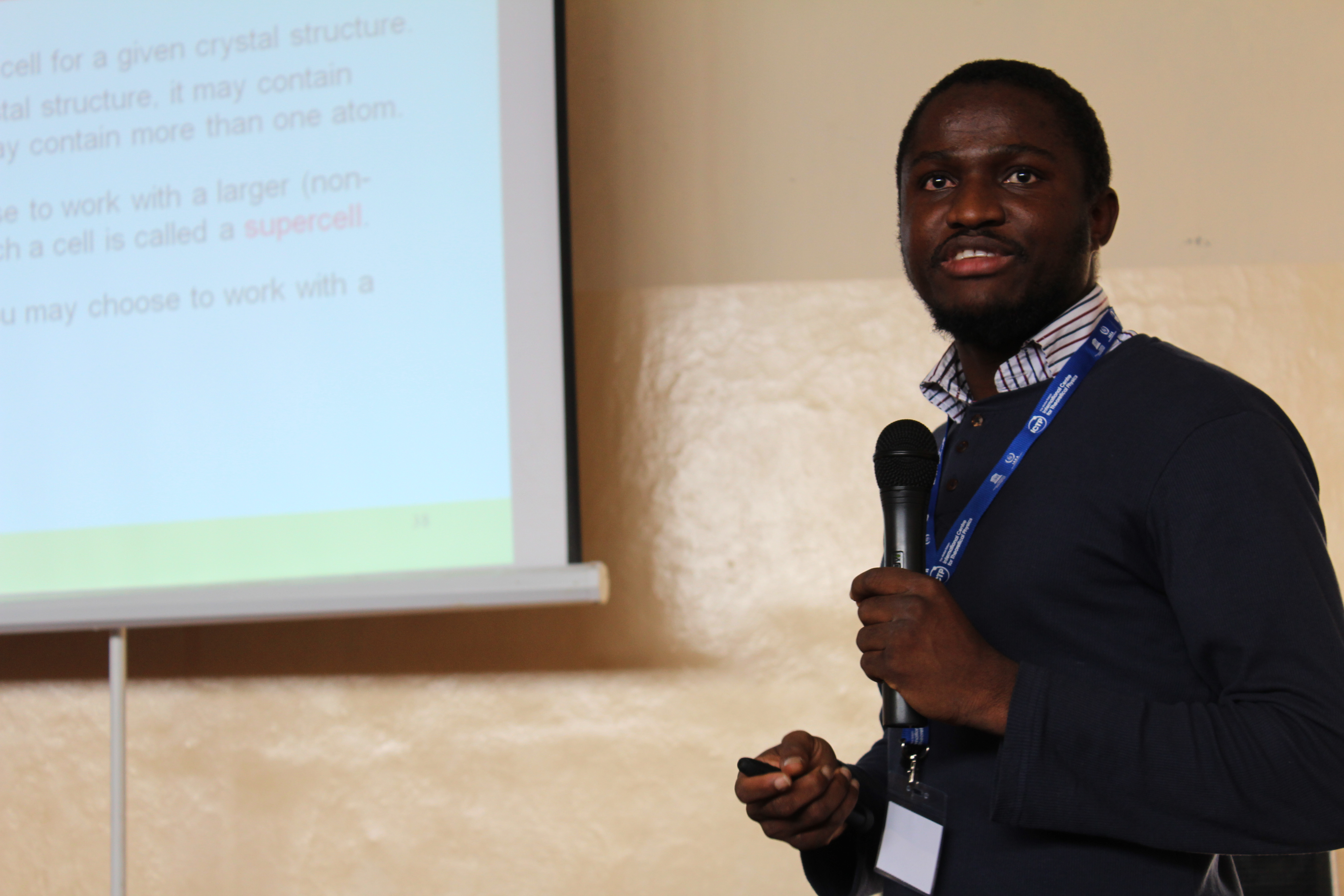 Mentor Yusuf Shaidu lectures on crystal structure.&nbsp;