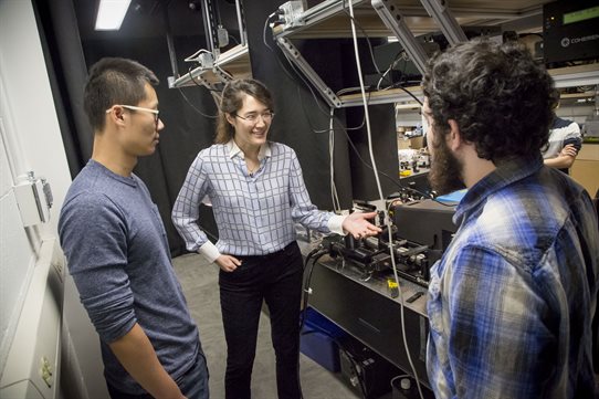 Virginia Lorenz works with graduate students in her lab at Loomis Laboratory