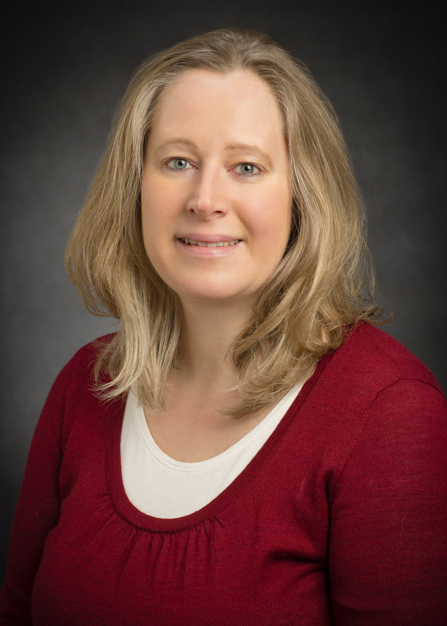 Headshot of Caroline Riedl.