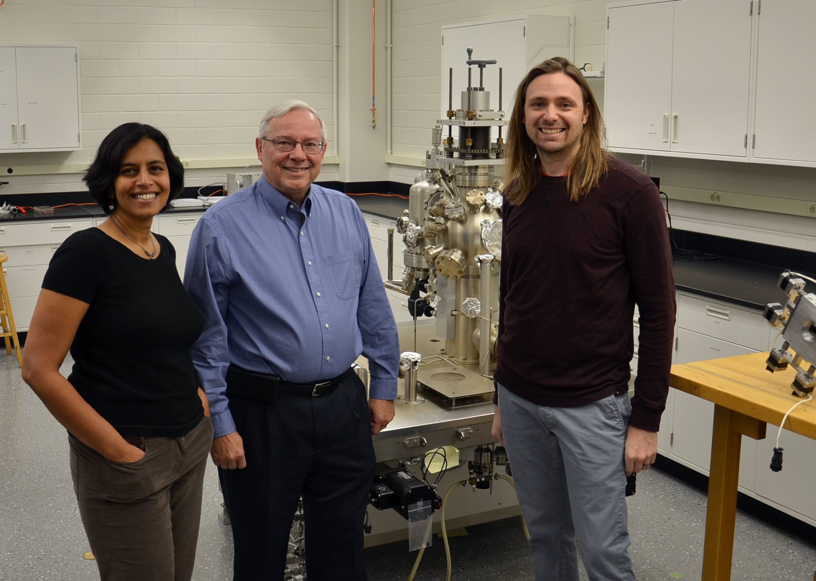 (Left to right) Illinois Physics Professors Vidya Madhavan, Dale Van Harlingen, and Taylor Hughes pose in the SEAMS lab in the Frederick Seitz Materials Research Laboratory. Photo by Siv Schwink for Illinois Physics