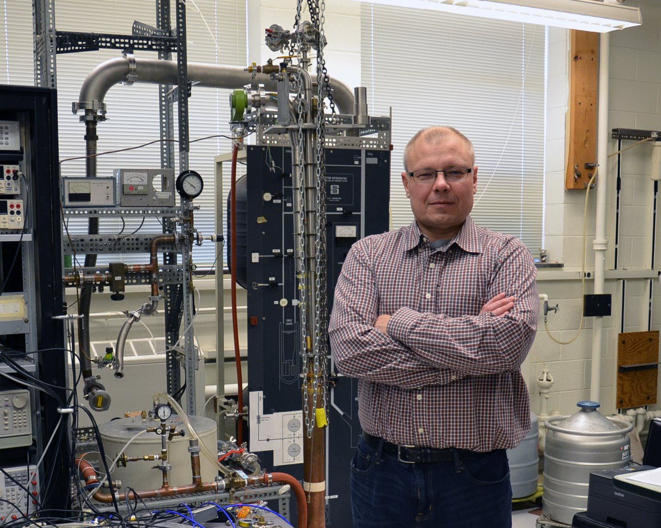 Illinois Physics Professor Alexey Bezryadin poses in his lab at the Loomis Laboratory of Physics in Urbana. Photo by Siv Schwink for Illinois Physics