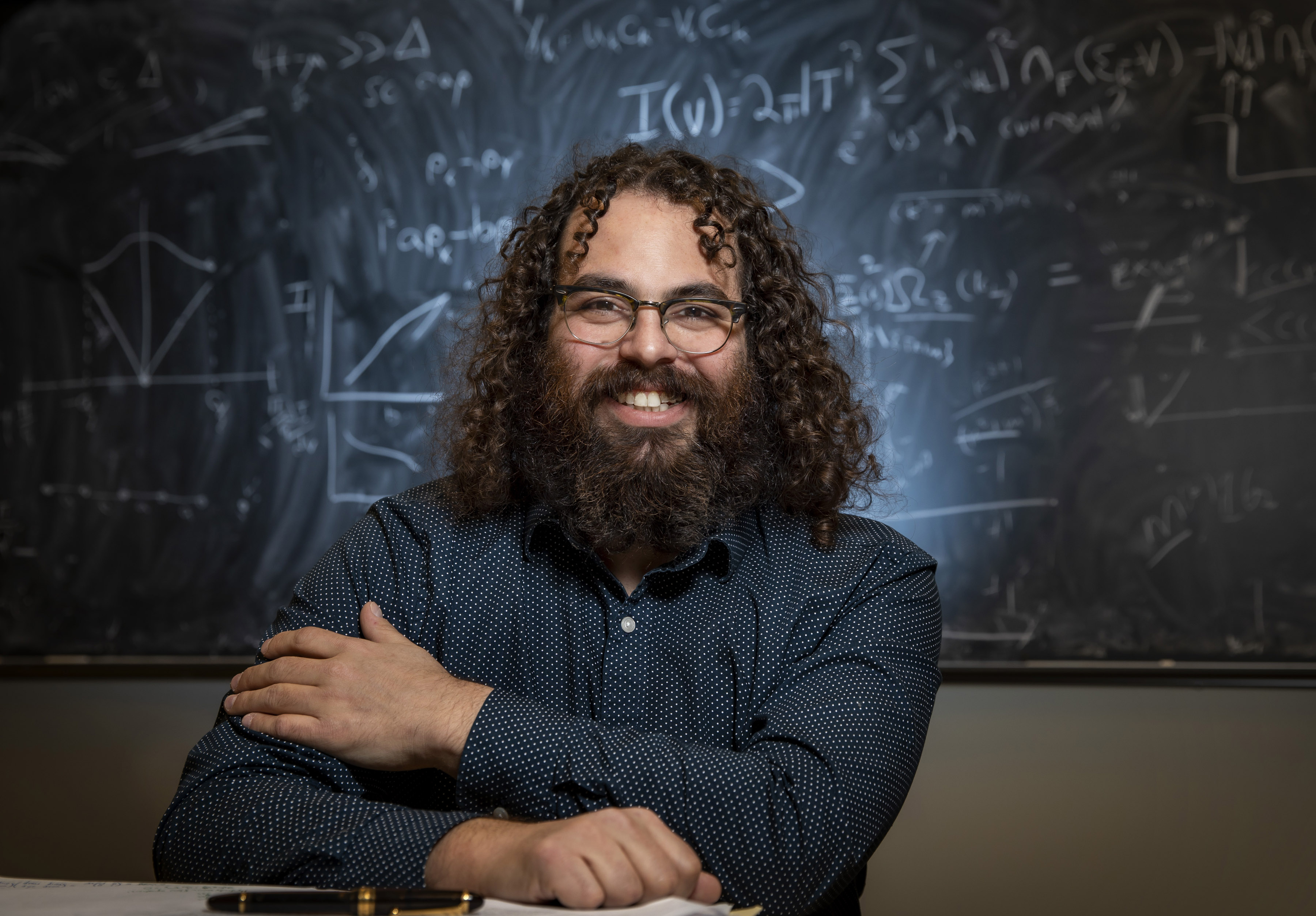 Illinois Physics Professor Barry Bradlyn is a condensed matter theorist who also studies the spread of hate speech on social media platforms using machine learning and mathematical and statistical analyses. He is a member of the Institute for Condensed Matter Theory in Urbana. Photo by Fred Zwicky, University of Illinois Urbana-Champaign