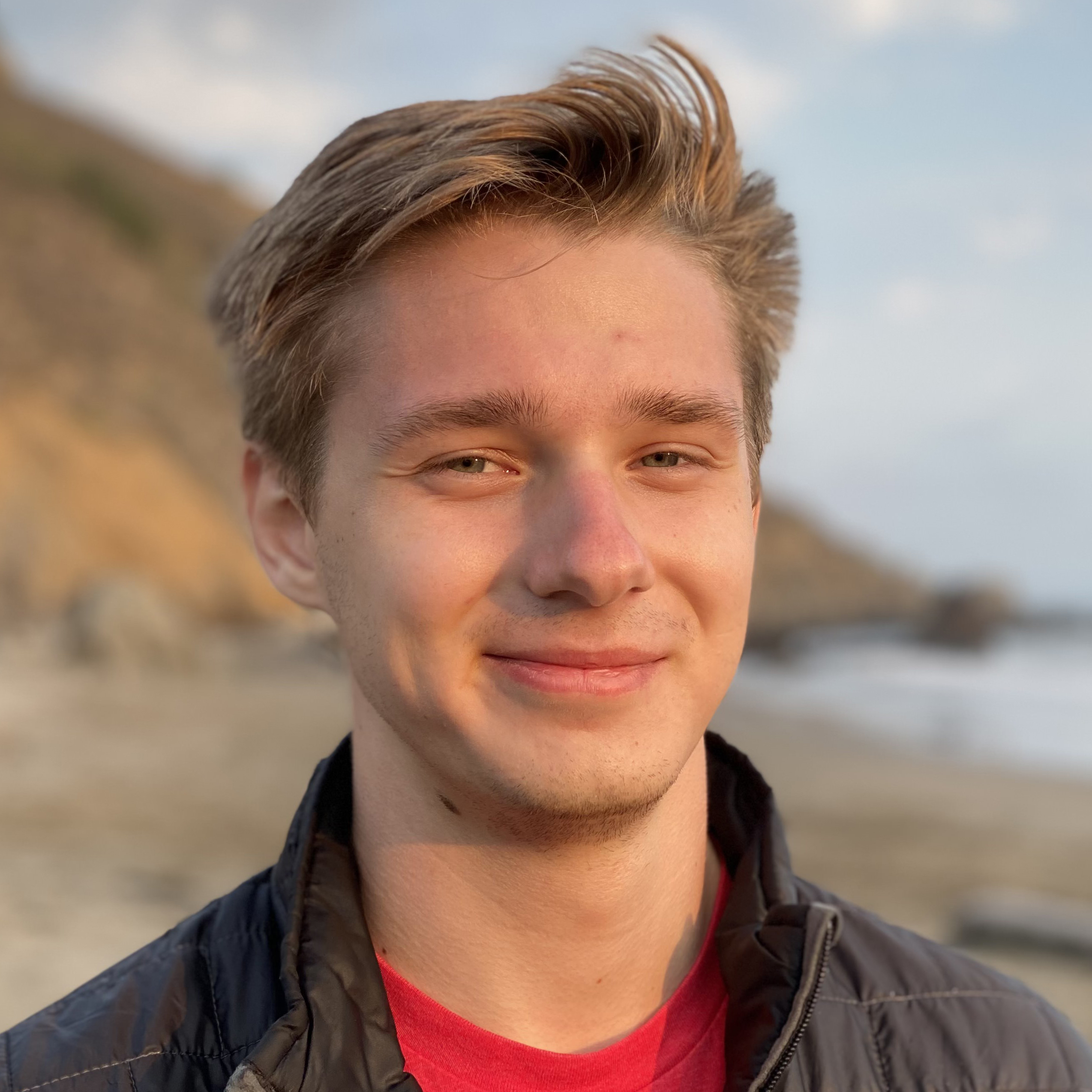 Headshot of Nathan Zachar.